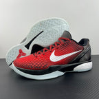 Red basketball sneaker with white swoosh, black collar, and visible sole pattern.