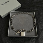 Silver-tone chain bracelet with padlock and two keys, in a gift box