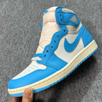 Air Jordan 1 Retro High OG sneakers, blue and white leather with cream midsole