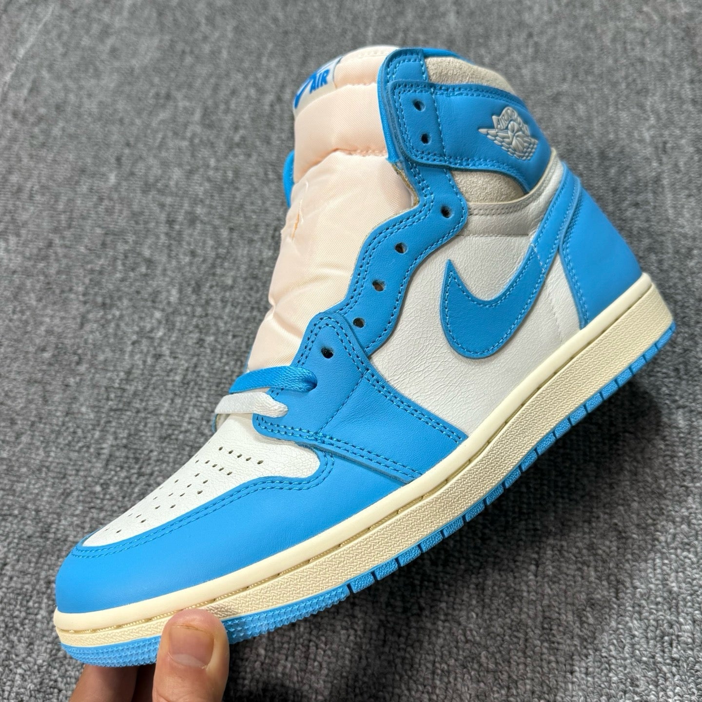 Air Jordan 1 Retro High OG sneakers, blue and white leather with cream midsole