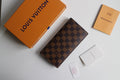 Louis Vuitton small checkered wallet, dark brown and tan with card slots and flap