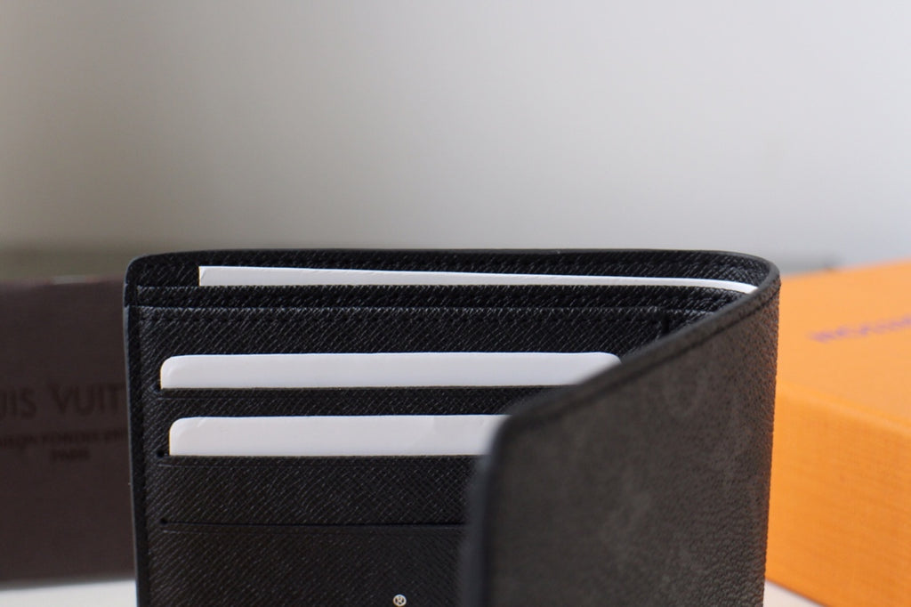 Louis Vuitton small bag, black leather card holder with three horizontal card slots