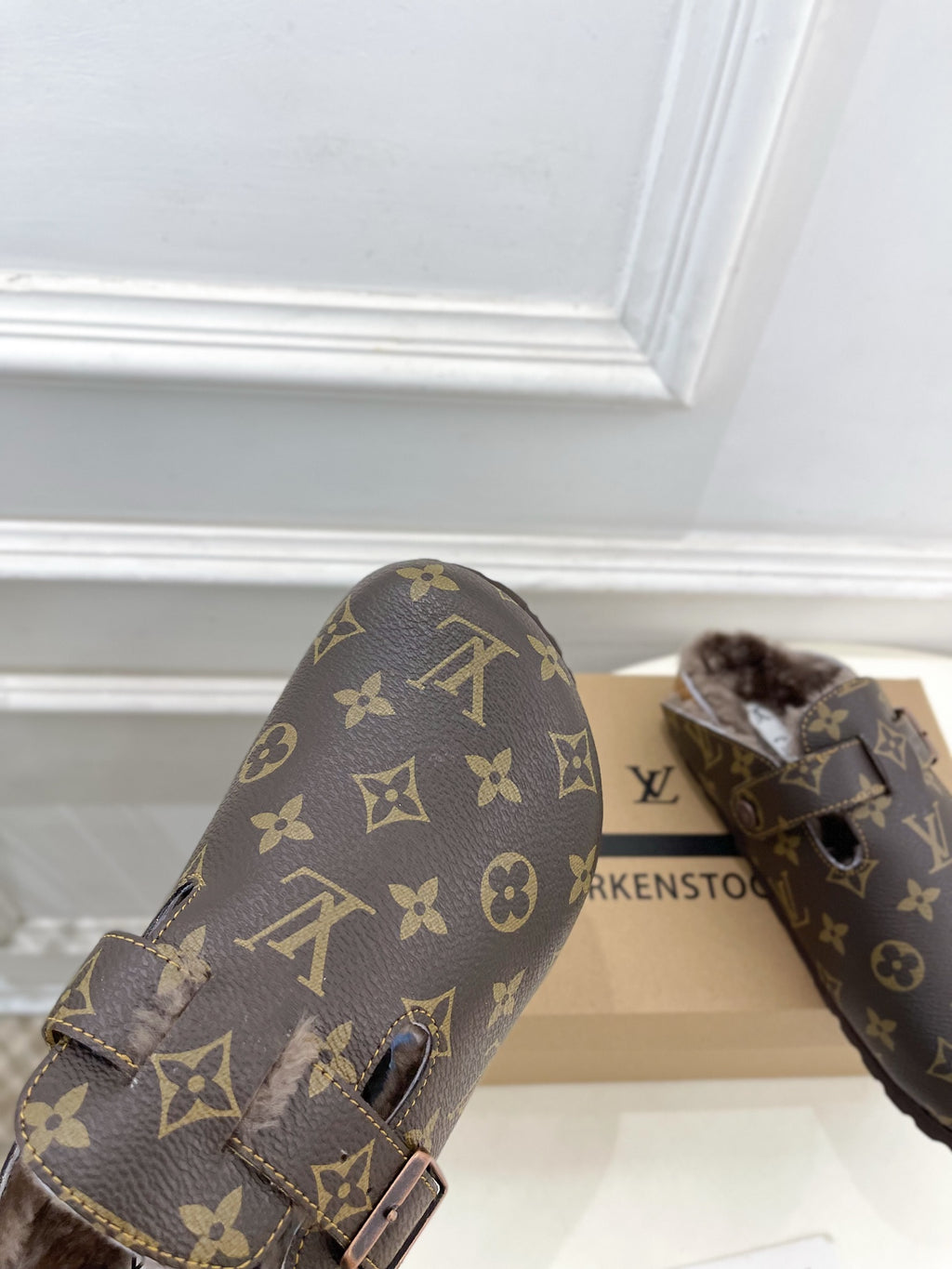 Louis Vuitton monogram sandals with two buckles and cushioned faux-fur footbed
