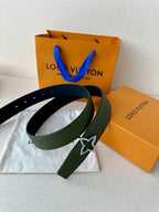Green leather belt with silver star buckle, shown with folded dark band