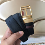 Leather belt with gold square buckle, dark blue strap and burgundy lining
