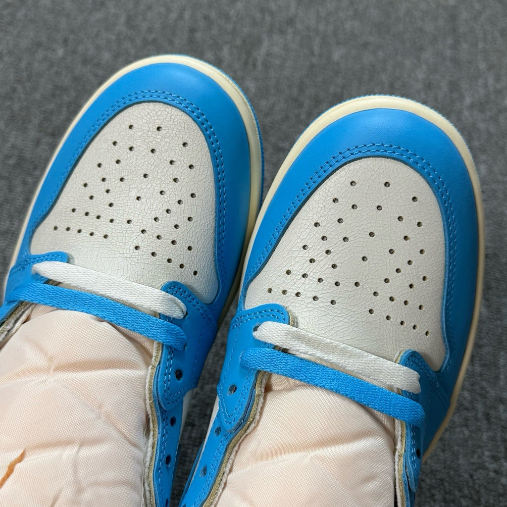 Air Jordan 1 Retro High OG sneakers, blue laces with perforated toe box