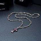 Silver-tone charm pendant necklace with cross drop and chain link details