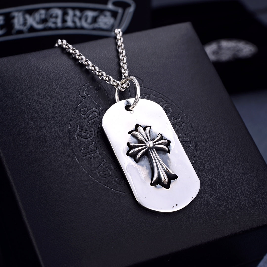 Dog tag pendant necklace with silver flower engraving on white tag
