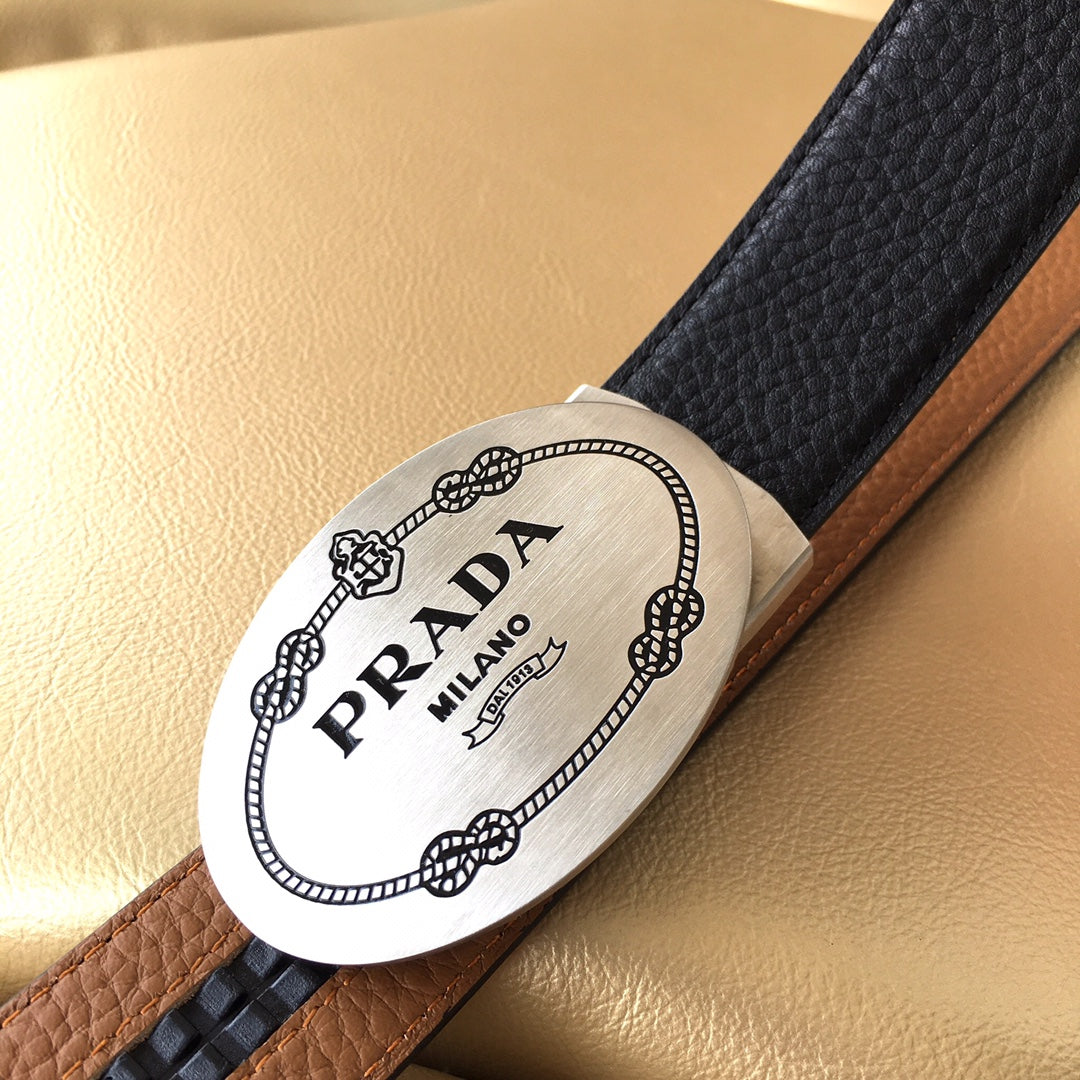 Leather belt end with Prada Milano logo patch, dark strap over brown section