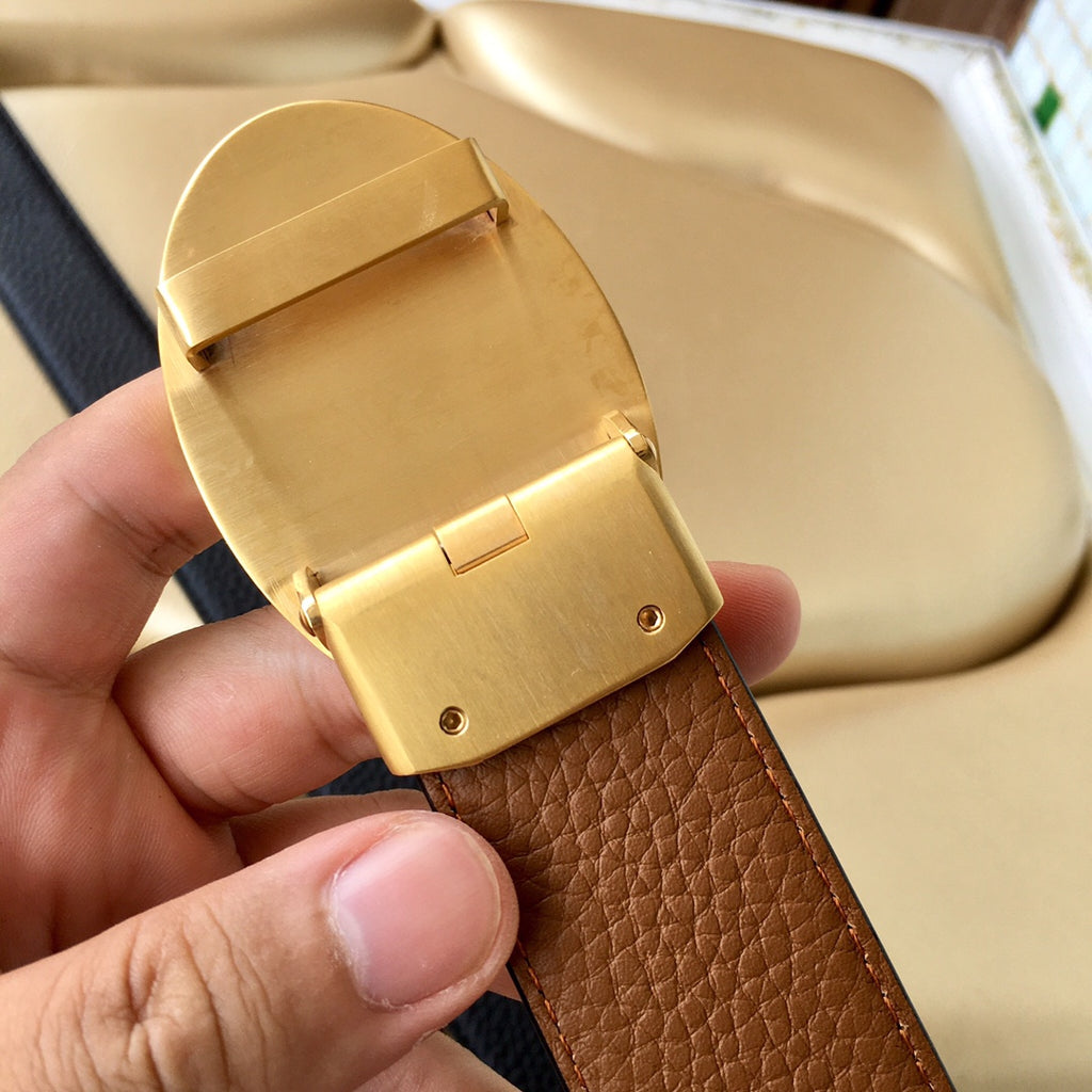 Prada belt buckle and reverse: gold-toned hardware with tan leather strap.