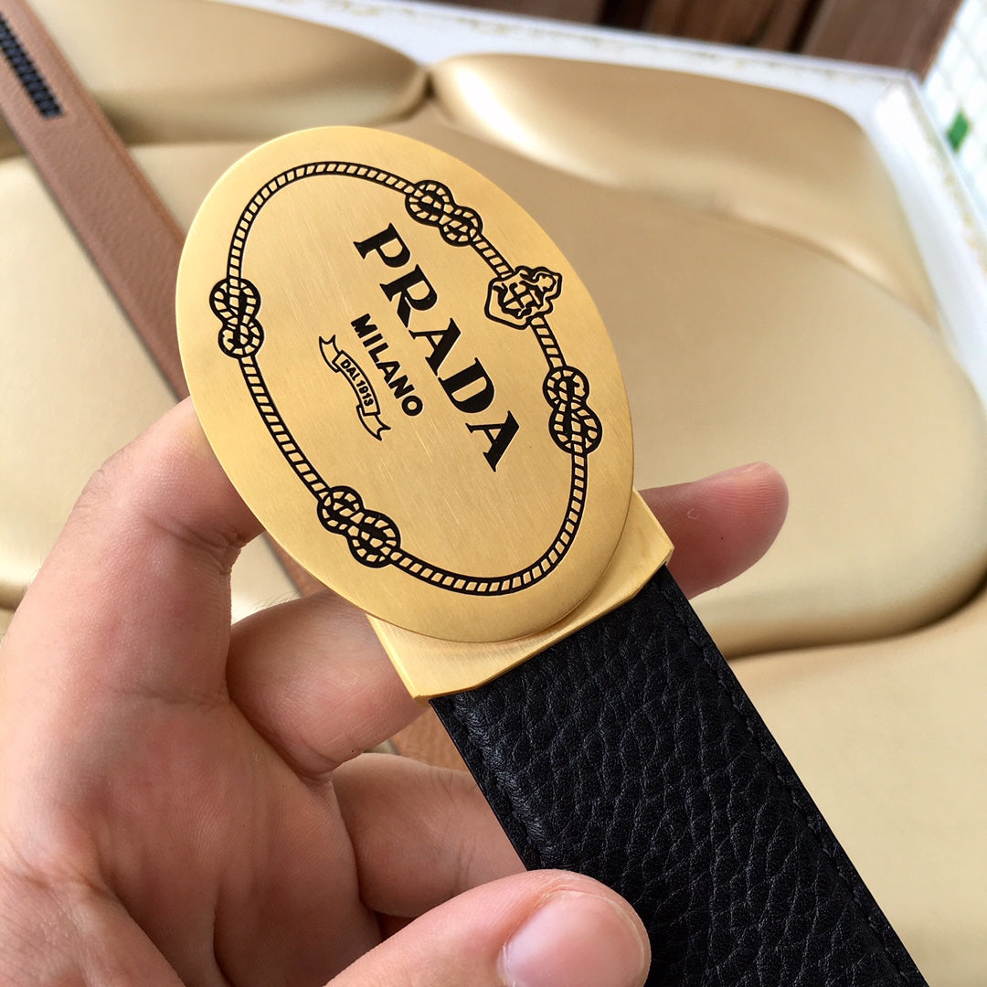 Prada belt logo buckle close-up on dark blue textured strap.