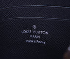 Louis Vuitton Paris made in France stamp on textured dark leather