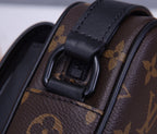 Louis Vuitton monogram bag side strap with black leather buckle and trim