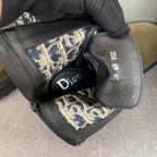 Dior-branded boot interior with printed lining and size tag on gray insole
