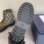 Rubber outsole of Dior unisex high-top boots with grid tread and Dior logo