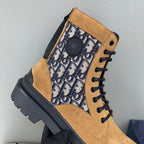 Tan suede ankle boots with Dior Oblique side panel, black laces, and lug sole