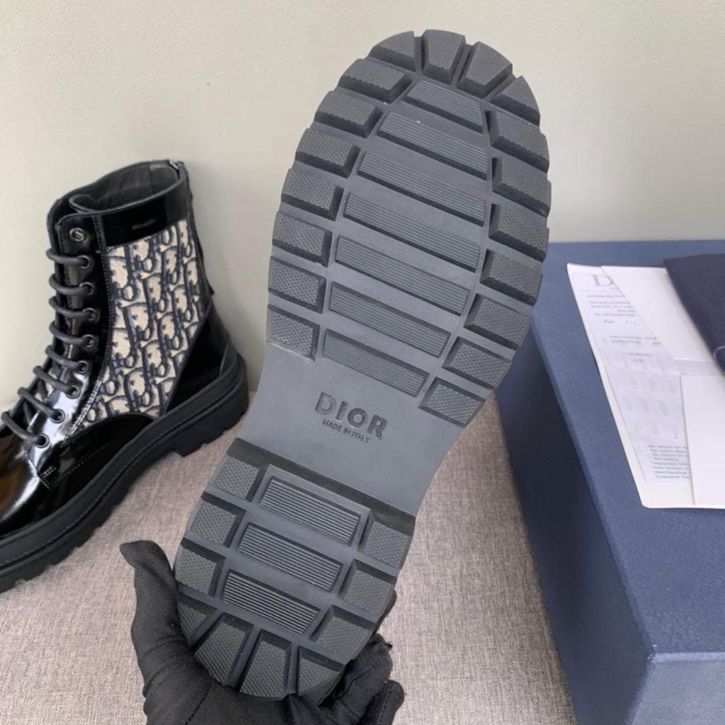 Dior unisex boot outsole, rugged gray tread with Dior branding on heel