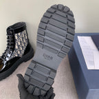 Dior unisex boot outsole, rugged gray tread with Dior branding on heel