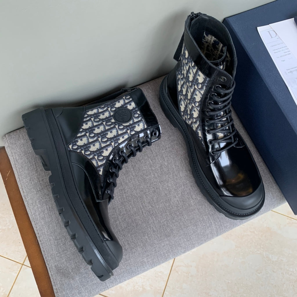 Dior unisex lace-up boots with black toe and beige monogram side panel, chunky sole