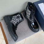 Dior unisex lace-up boots with black toe and beige monogram side panel, chunky sole