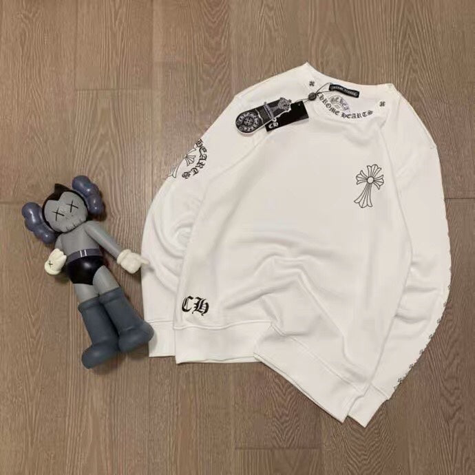 White long-sleeve sweatshirt, crew neck, small chest emblem, flat lay