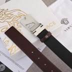 Brown leather belt with silver-toned Versace buckle and pin closure