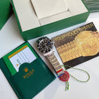 Rolex Submariner watch with black dial, date window, stainless steel bracelet