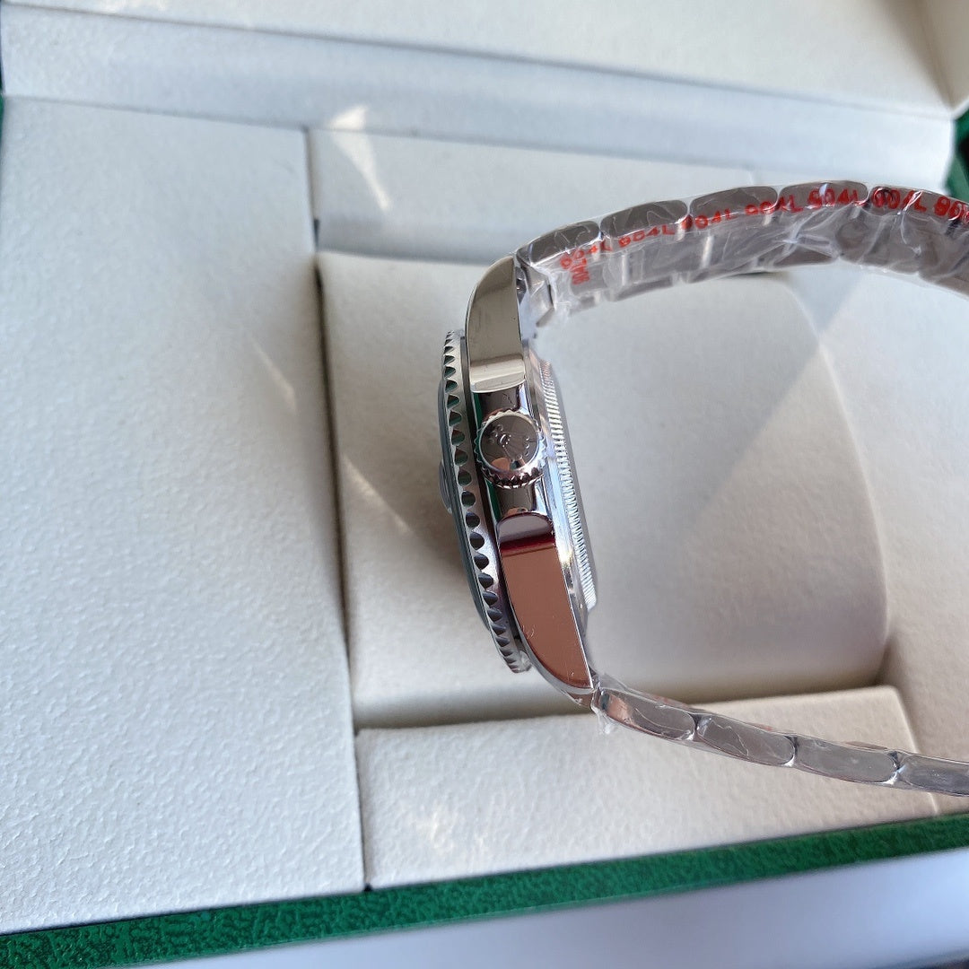 Stainless steel watch case side with crown and rotating bezel teeth