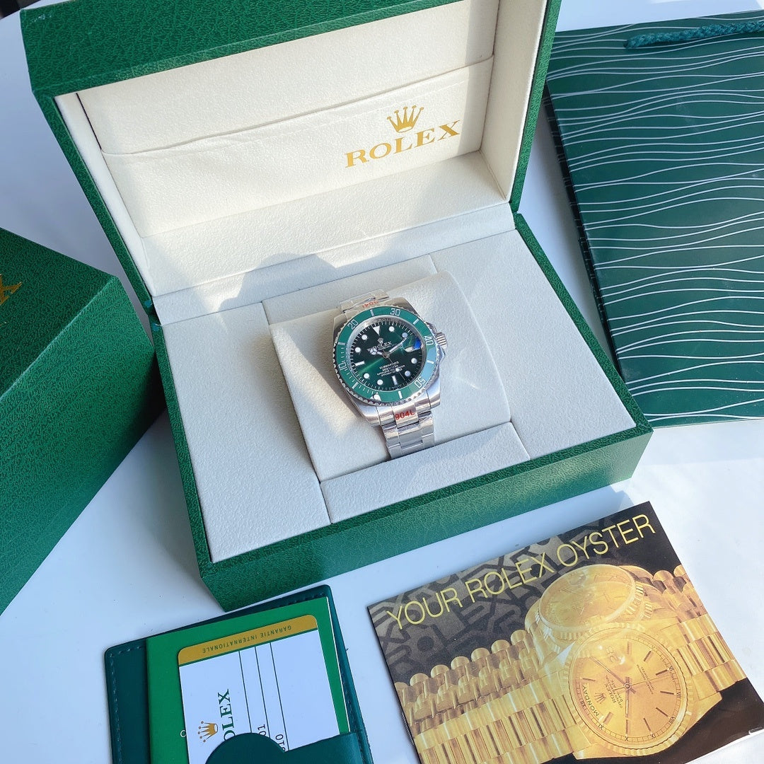 Green dial wristwatch front view with stainless steel bracelet and rotating bezel