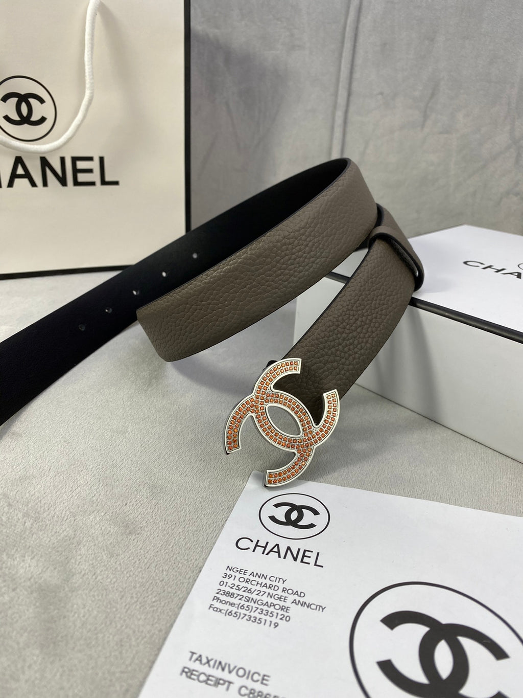 Chanel leather belt with gold rhinestone-style CC buckle, dark taupe strap