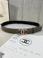 Chanel belt in dark taupe leather with gold CC logo buckle at center