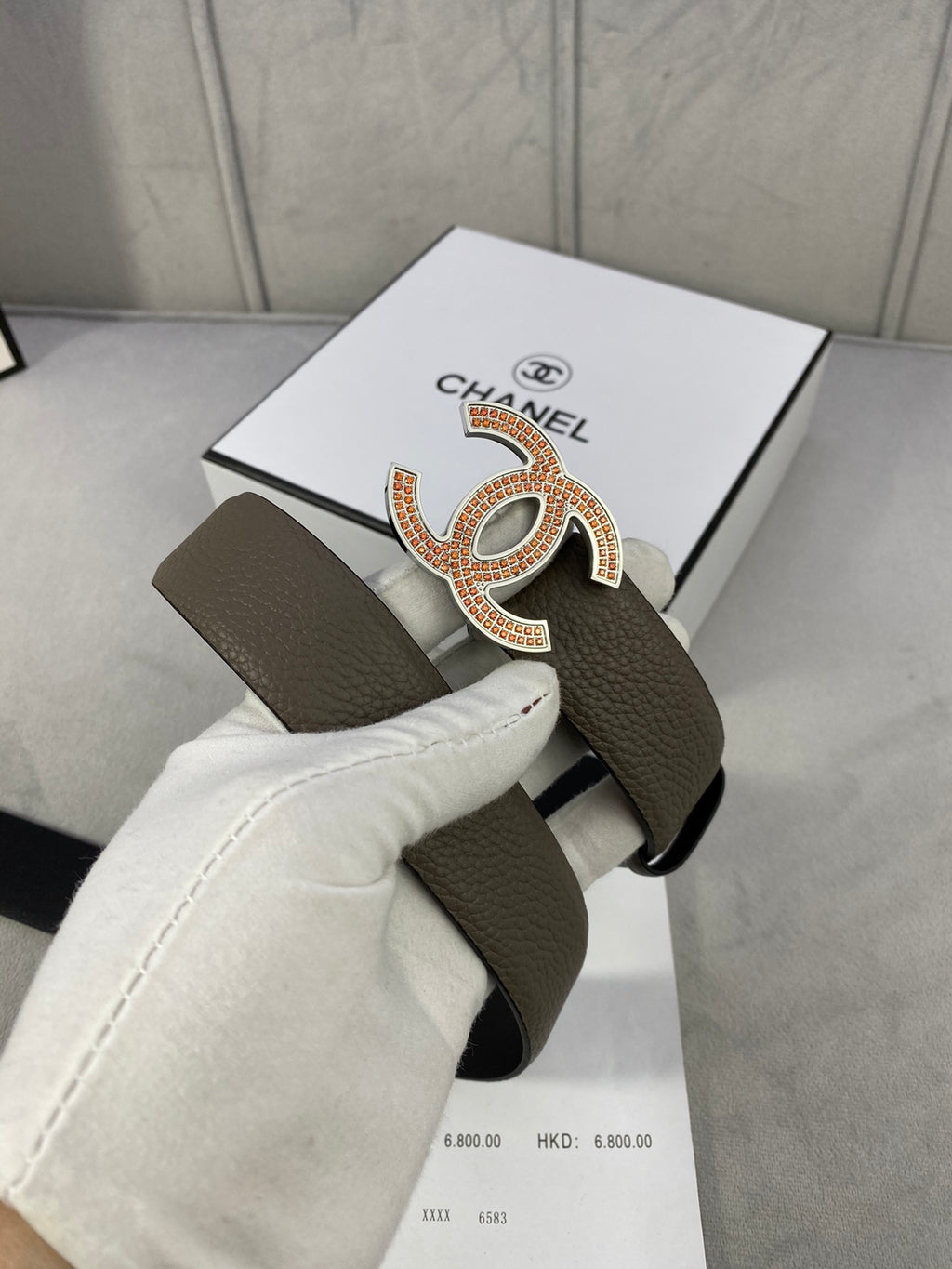 Chanel belt with gold CC logo buckle on dark taupe leather, with strap and papers