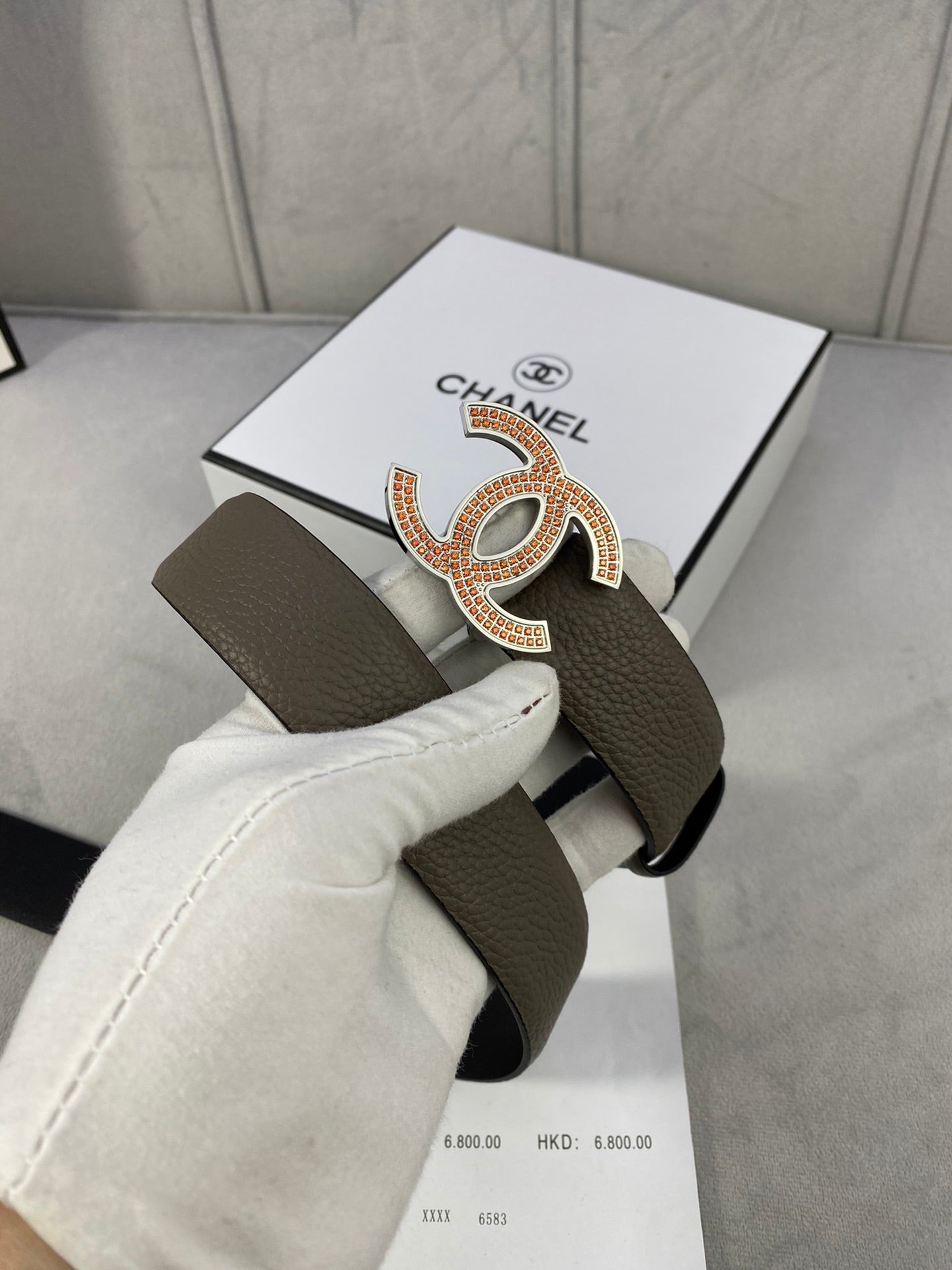 Chanel belt with gold CC logo buckle on dark taupe leather, with strap and papers