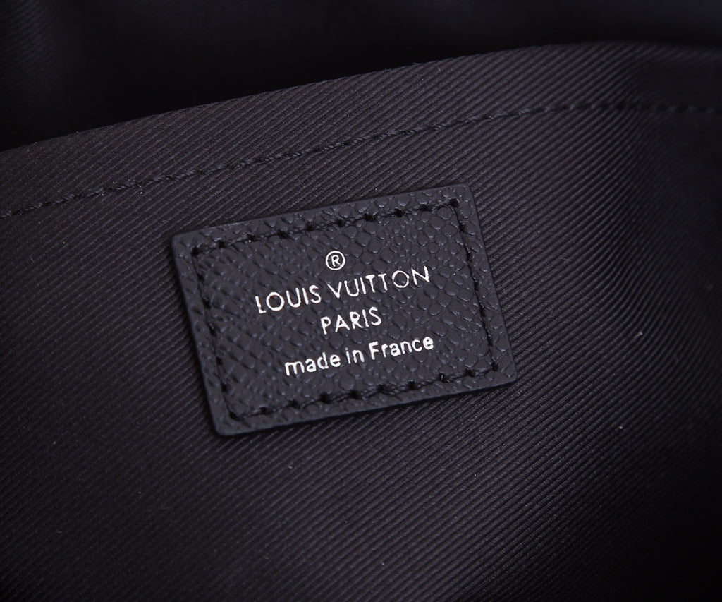 Louis Vuitton Paris made in France leather label on black bag lining