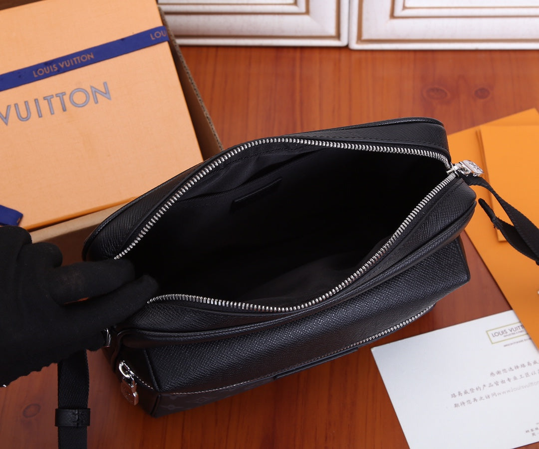 Men's Louis Vuitton bag open interior view with zip and black leather lining
