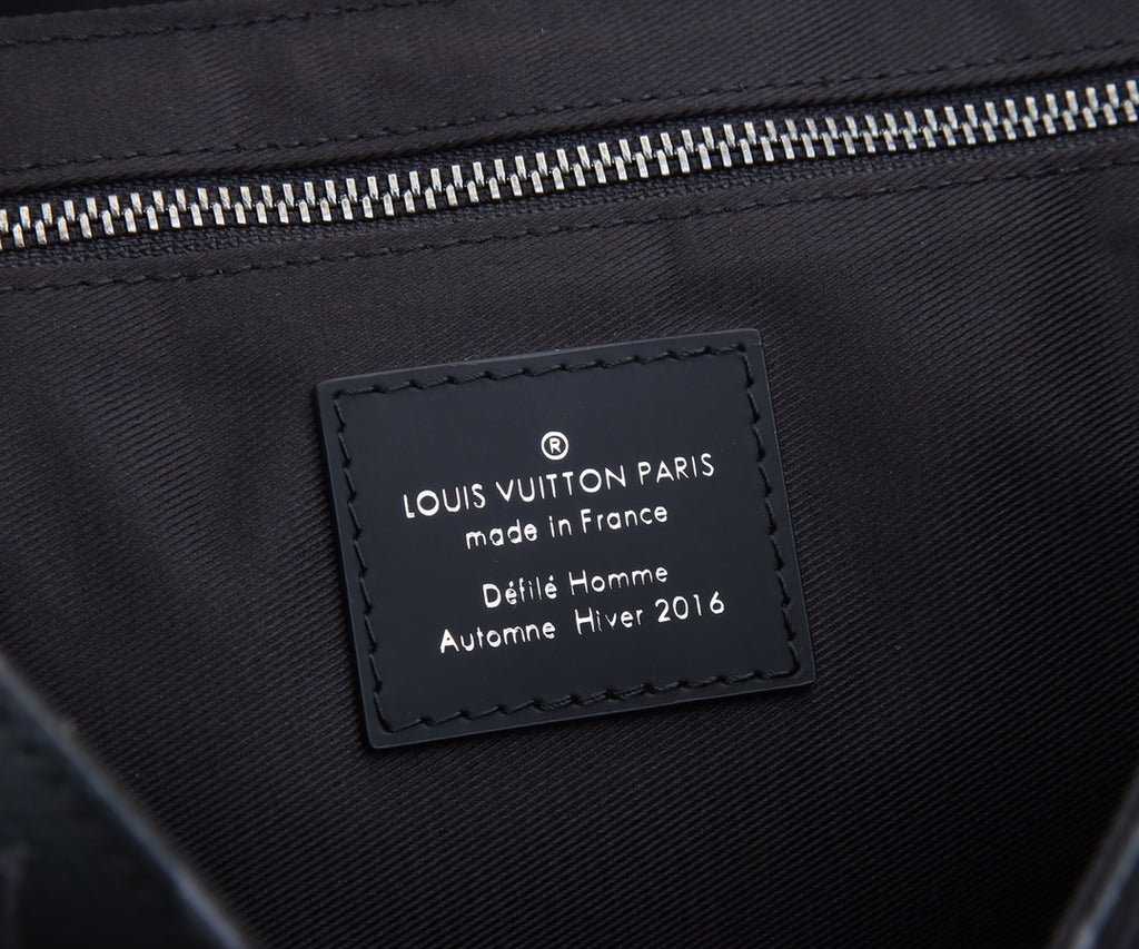 Louis Vuitton Paris label reading “made in France,” with collection details