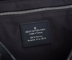 Louis Vuitton Paris label reading “made in France,” with collection details