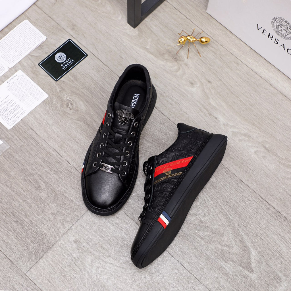 Black Versace lace-up sneakers shown from top with red and blue side stripe