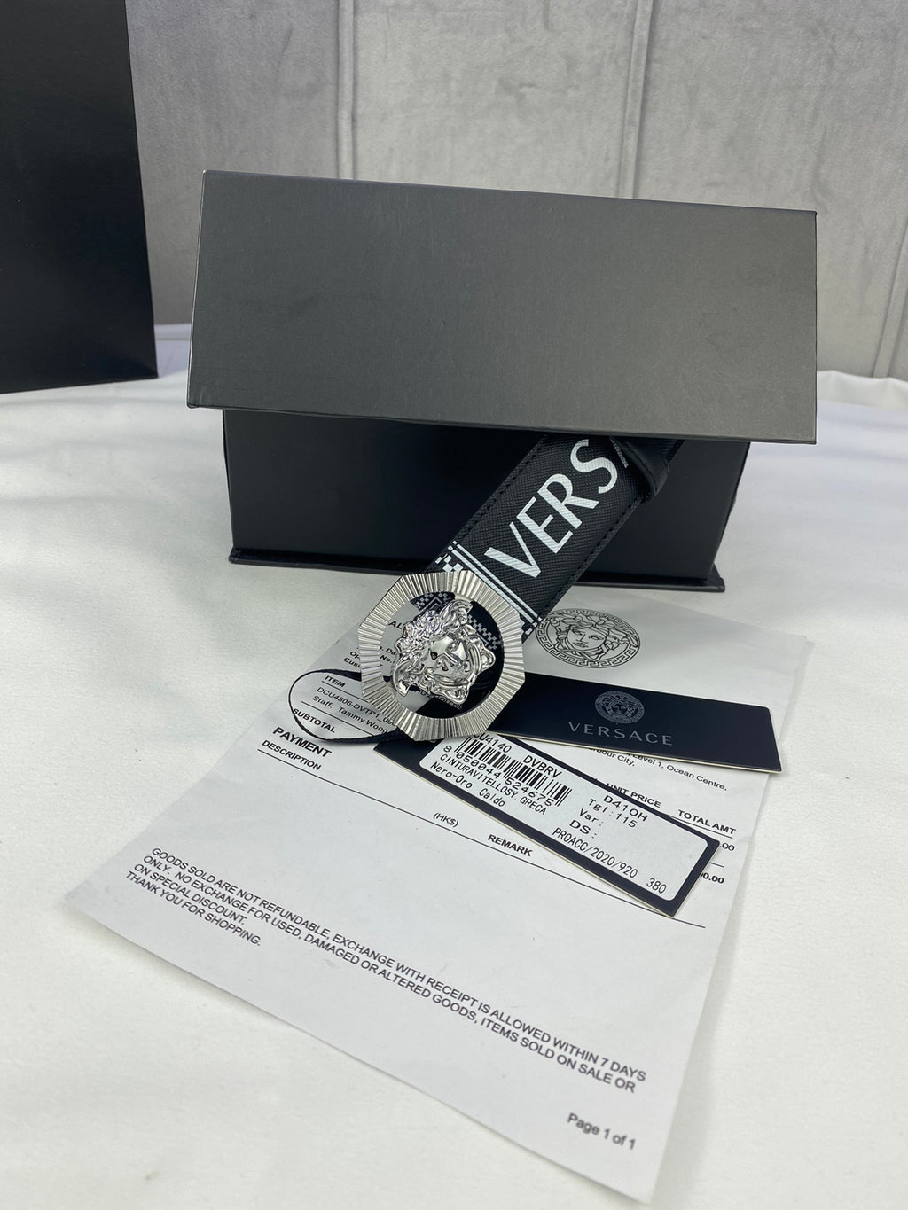 Versace belt in black with logo strap and silver-toned medallion buckle, shown with tags