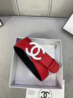 Red leather belt with white CC logo buckle, strap end holes