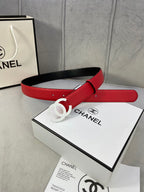 Red leather belt with white CC buckle and black inner strap