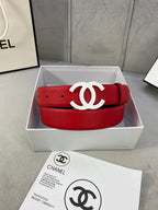 Red leather belt with white CC buckle, centered on display