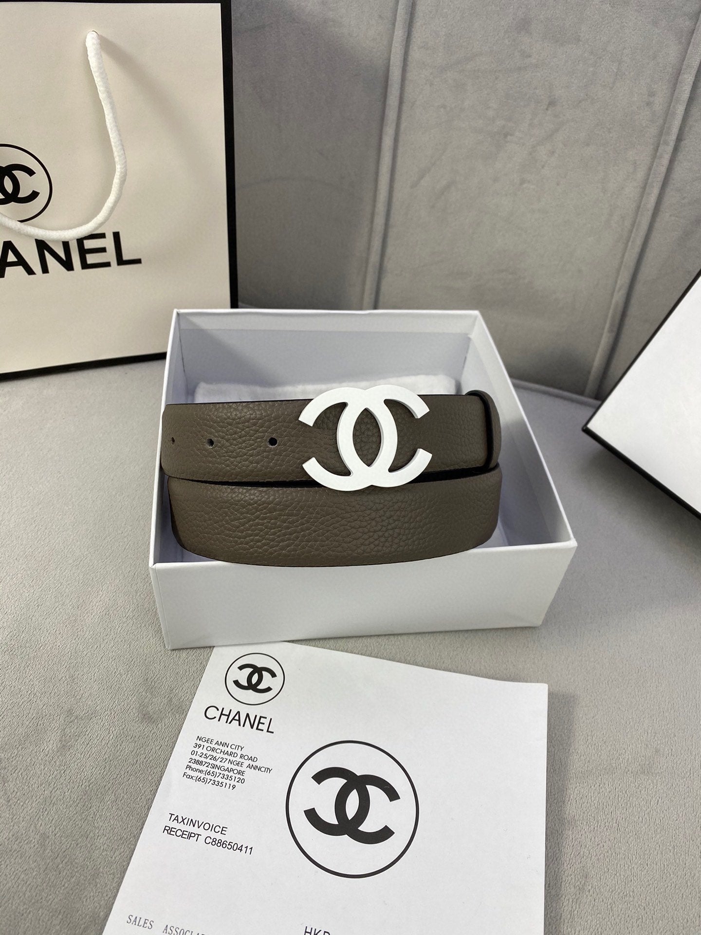Dark olive leather belt with silver-tone interlocking CC buckle, in gift box