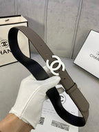 Dark olive leather belt with silver-tone interlocking CC buckle, side view