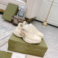 Gucci unisex sneakers, white leather look with logo detailing and lace-up front