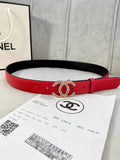 Red leather belt with gold-tone Chanel CC buckle and adjustable holes, black underside.