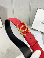 Red leather belt with gold-tone Chanel CC buckle and perforated adjustment holes.