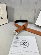 Tan leather belt with rhinestone CC buckle, shown with adjustable strap