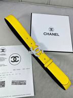 Yellow and black two-tone Chanel belt with silver rhinestone CC buckle