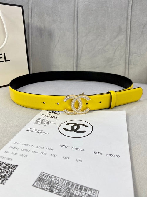 Yellow leather belt with silver rhinestone Chanel CC buckle, black underside